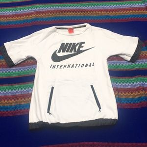 Nike short sleeve terry/vinyl sweatshirt.